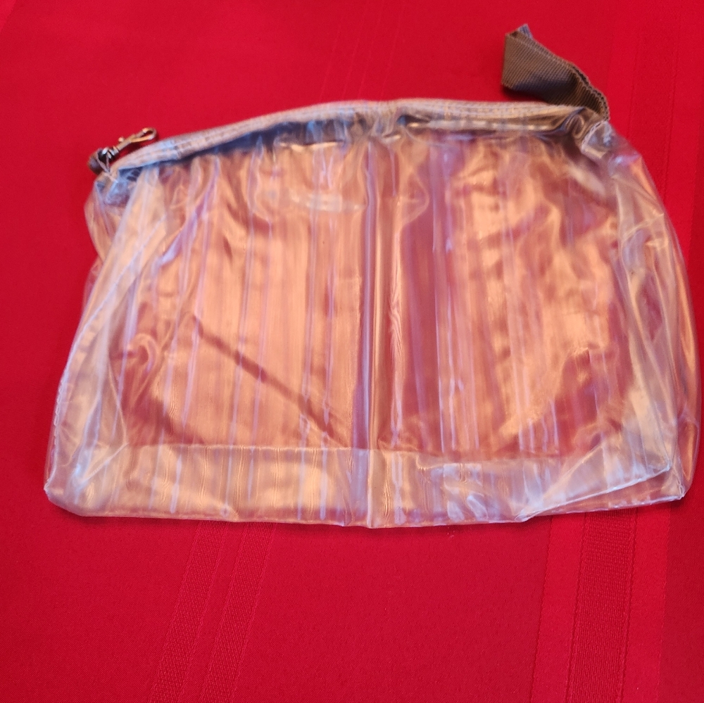 Source Unknown Clear PVC Cosmetic Pouch with Pink Lining